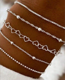 A Silver five - piece set Chic Multi - Layered Alloy Bracelet Set - Fashionable Stackable Jewelry - RnR Galore