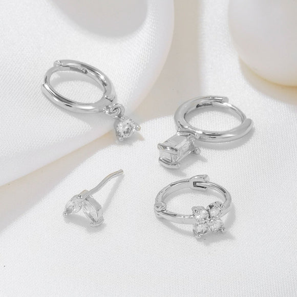 Four - piece set Silver Delicate CZ Earring Stacking Set - Huggie Hoops & Studs for Multiple Piercings - RnR Galore